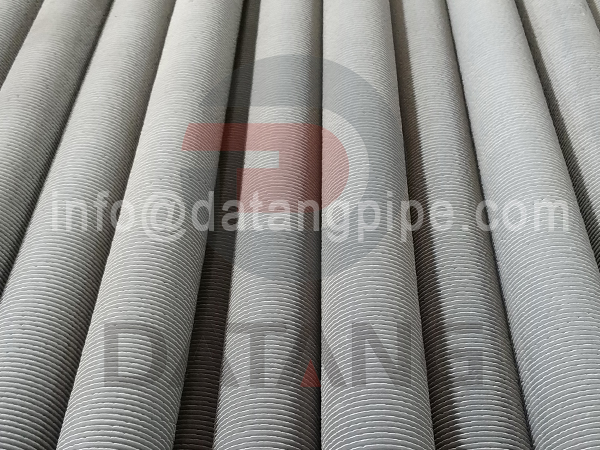 Extruded finned tube