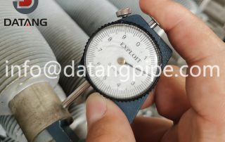 Manufacturing process of extruded aluminum finned tubes