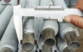 Extruded fin tube with aluminum fins